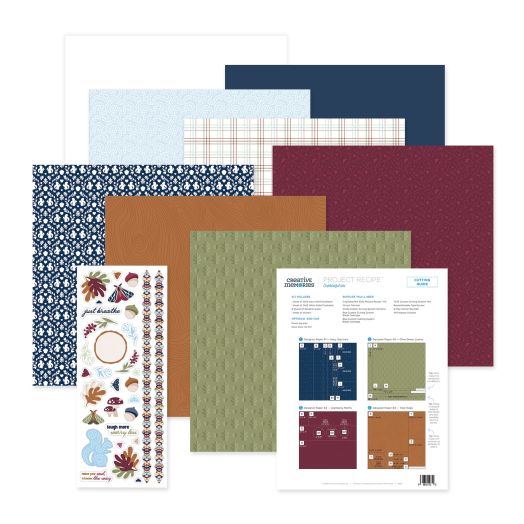 6 sheets of designer paper, 1 sheet of white cardstock, 1 sheet of navy cardstock, 1 sticker sheet and a sheet of instructions.