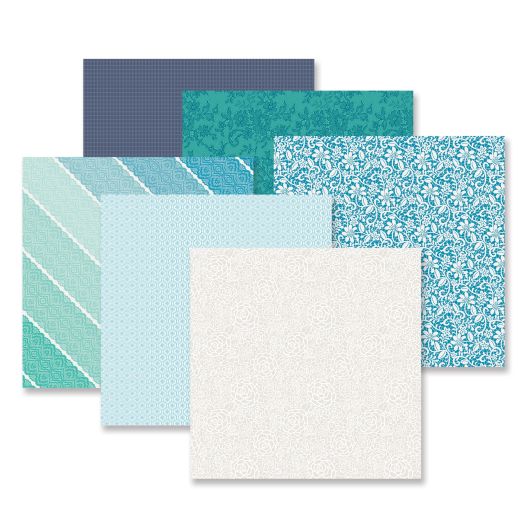 Totally Tonal Winter Paper Pack on a white background. Features lace designs in icy blue colors.