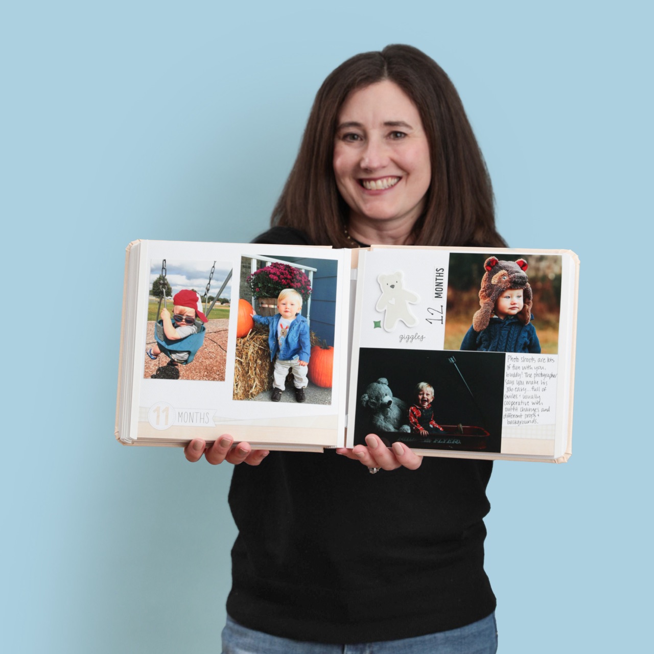 Woman Holding Scrapbook